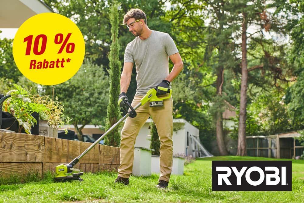 Person trimmt Rasen mit Rasentrimmer